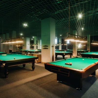 billiard-table-with-green-surface-and-balls-in-the-billiard-club-pool-game-e1640711989794-pi6tl72fwkx0plogajycapborlm984co1nzyt160hs